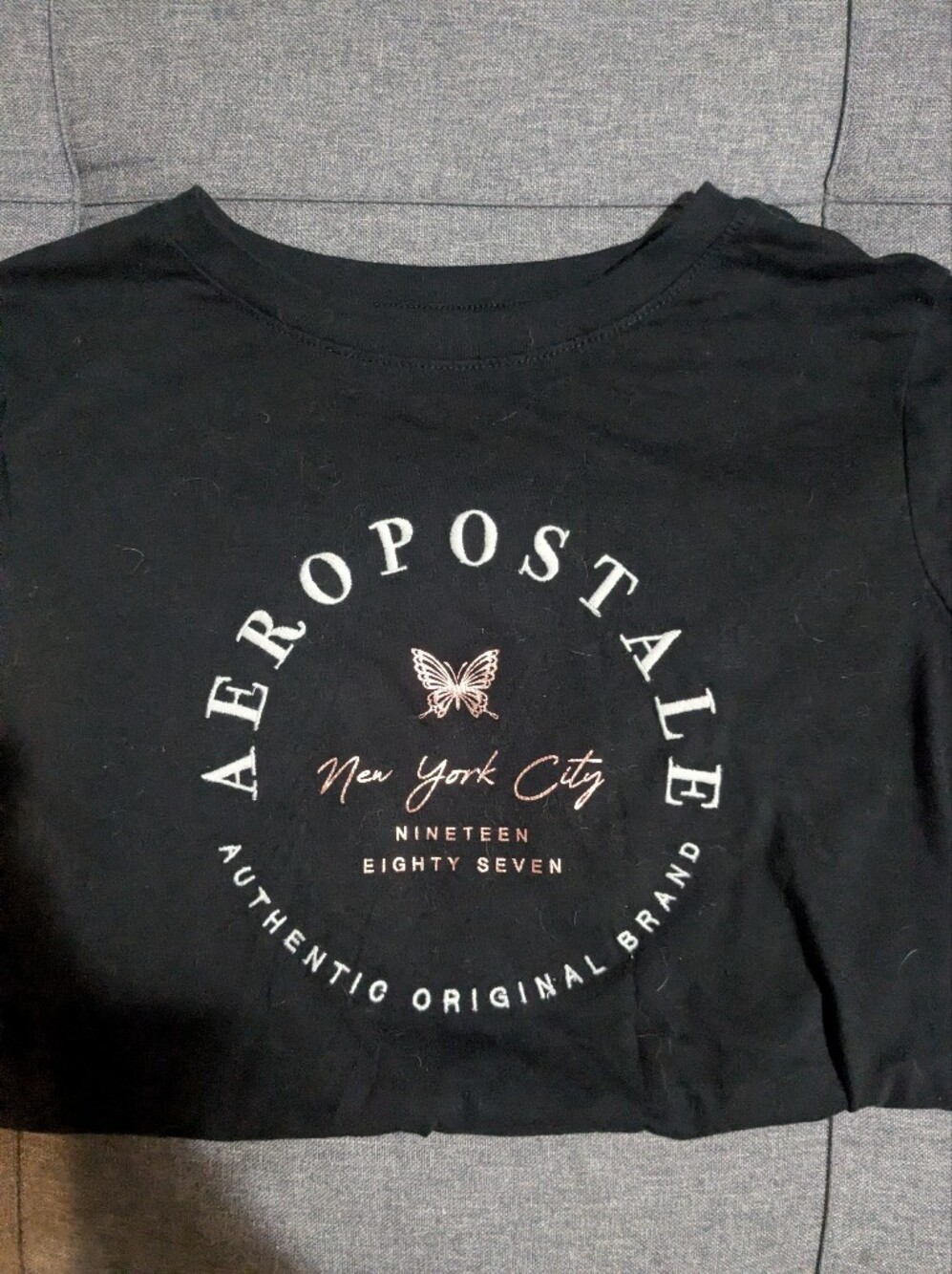 Aeropostale Black Tee with Pink Butterfly and New York City Script